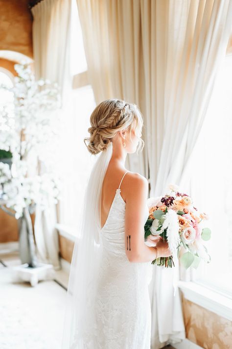 Boho Wedding Updo With Veil, Wedding Hair Updo Veil Under, Veil Hair Updo Brides, Wedding Veil Below Bun, Veil Over Or Under Bun, Wedding Hair For Bride Updo Veils, Bride Updo With Veil Underneath, Wedding Hairstyles With Veil Braid, Wedding Updo With Vail