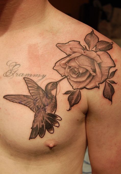 hummingbird-rose-hummingbird-bird-rose-black-and-grey-single-needle-fine-line-chest-tattoo-shoulder Humming Bird Tattoo For Men, Men’s Hummingbird Tattoo, Mens Hummingbird Tattoo, Hummingbird Rose Tattoo, Bird Rose Tattoo, Hummingbird Tattoo For Men, Hummingbird And Rose Tattoo, Hummingbird Flower Tattoos, Rose Chest Tattoo