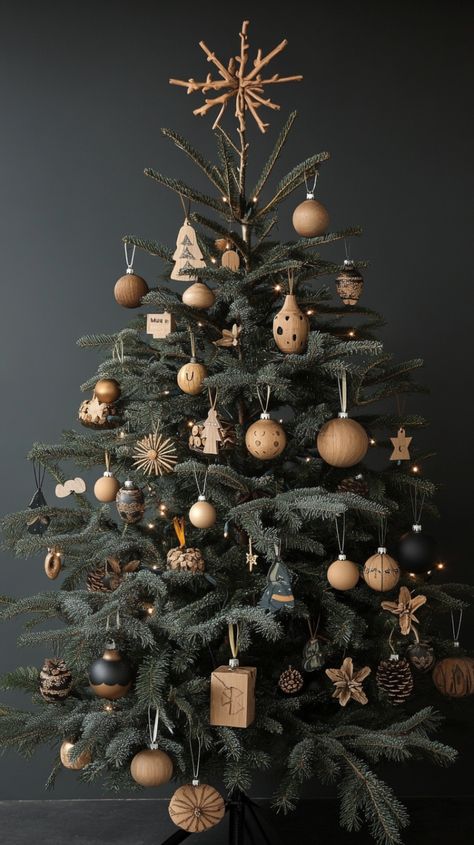 Christmas Tree Decor 2024: Must-Have Trends You’ll Love This Season German Style Christmas Tree, Plant Themed Christmas Tree, Terrain Christmas Tree, Masculine Christmas Tree Ideas, Minimal Tree Decor, Scandi Christmas Tree Decorations, Year Round Tree Decorations, Christmas Trees With Tinsel, Christmas Tree Trends 2024/2025