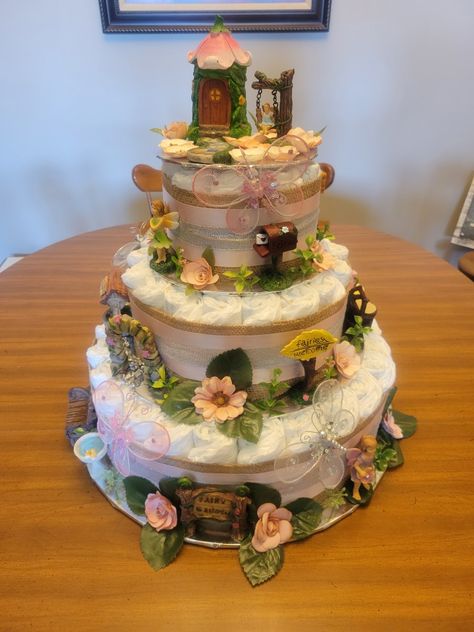 Fairy Garden Baby Shower Cake, Mushroom Diaper Cake, Fairy Themed Baby Shower Ideas, Fairy Baby Shower Cake, Fairy Diaper Cake, Cottagecore Baby Shower Ideas, Fairy Baby Shower Ideas, Enchanted Forest Baby Shower Theme, Shrek Baby