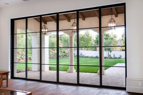 Colonial bar stacker doors from bar and alfresco. Balcony Door Design, French Door Decor, Modern Sliding Glass Doors, Single Patio Door, Pintu Interior, Mediterranean Patio, Patio Windows, Sliding French Doors, Sliding Door Design