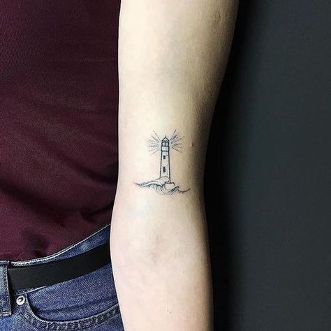 10 Minimalist Tattoo Designs For Your First Tattoo - Society19 UK Minimalist Tattoo Meaning, Lighthouse Tattoo, Shape Tattoo, Handpoke Tattoo, Subtle Tattoos, Hand Tattoo, Tattoo Trends, Pattern Tattoo, Simplistic Tattoos