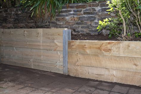 11 Retaining Wall Ideas That Work Hard While Looking Good - Bob Vila Budget Retaining Wall, Low Retaining Wall Ideas Flower Beds, Diy Retaining Wall Ideas, Diy Small Retaining Wall, Wooden Retaining Wall Ideas, Diy Retaining Wall Cheap, Easy Retaining Wall Ideas Cheap, Diy Retaining Wall Cheap Budget, Short Retaining Wall Ideas