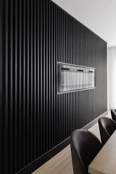 Black Slat Wall, Theatre Room Decor, Wood Trim Accent Wall, Trim Accent Wall, Slat Accent Wall, Light Stained Wood, Monochromatic Living Room, Slat Walls, Slat Wall Panel