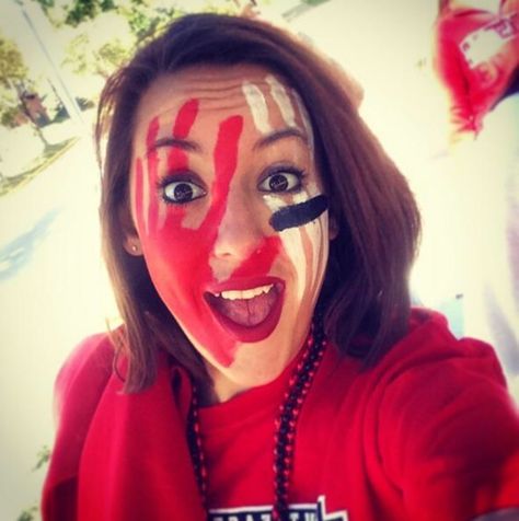 Game day face painting Chiefs Face Paint, Fan Face Paint, Football Makeup, Football Face Paint, Team Decor, Red Face, Red Ribbon Week, Pep Rally, Crazy Fans