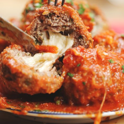 Easy Slow Cooker Mozzarella-Stuffed Meatballs And Sauce Recipe by Tasty Stuffed Meatballs, Mozzarella Stuffed Meatballs, Slow Cooker Meatballs, Crock Pot Recipes, Slow Cooked Meals, Homemade Tomato Sauce, Easy Slow Cooker, Meatball Recipes, Cooker Recipes