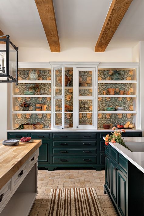 Benjamin Moore’s Salamander on the lower cabinets and white quartz countertops enliven the kitchen. The open shelves showcase a classic Morris & Co. wallpaper. Morris Co Wallpaper, Rose Tarlow Melrose House, Morris And Co, White Quartz Countertops, Wrought Iron Staircase, Santa Barbara Style, Lower Cabinets, Huge Library, Walnut Cabinets