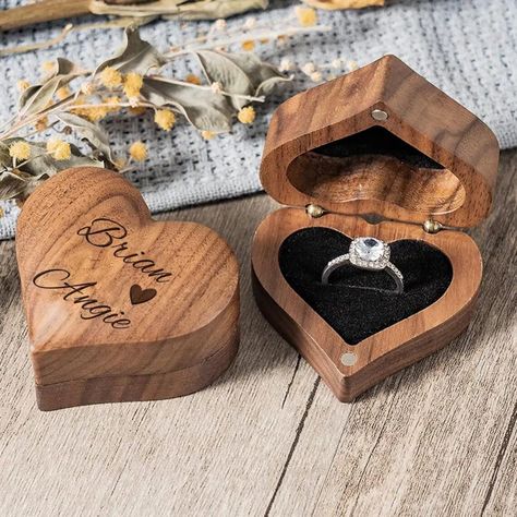 This wooden ring box is designed specifically for proposals, engagements, and storing rings. Made from high-quality wood, it boasts a beautiful surface that adds to its elegance. The box is spacious enough to fit multiple rings, and can be personalized with a unique name to make it a one-of-a-kind keepsake for your future memories. Heart Proposal, Unique Ring Box, Wooden Ring Box Wedding, Engagement Box, Personalized Ring Box, Proposal Ring Box, Multiple Rings, Wooden Ring Box, Boyfriend Diy