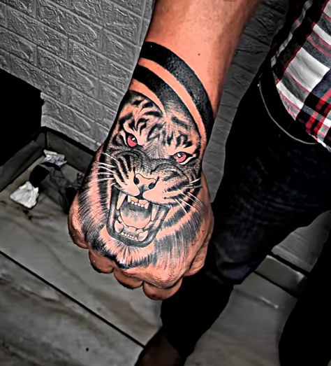 Hand Lion Tattoo Design, Lion Tattoo Hand, Lion Hand Tattoo Men, Boys Hand Tattoo, Tiger Hand Tattoo, Lion Hand Tattoo, Arm Tattoos Black, Cute Tattoo Ideas, Half Sleeve Tattoo Stencils