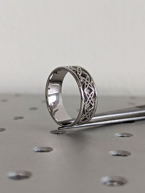 Symbolic of eternal loyalty, faith and love, Celtic infinity knots adorn this handsome Irish-style wedding band.

#Celtic #Ring #Celtic #Knot #Men's #Ring #Gold #Ring #for #Women #Irish #Knot #Ring #Gold #Men's #Ring #Men's #Jewelry #Christmas #Gift #for #Men #celtic #ring #celtic #know #ring #mens #ring #wedding #band #ring #for #men #gold #mens #ring #mens #band #gold #ring #men #knot #ring #irish #ring #irish #band #celtic #gold #infinity #ring Celtic Infinity Knot, Irish Knot, Men Pictures, Geometric Diamond Ring, Font Arial, Black Zirconium Ring, Christmas Gift For Men, Irish Style, Gold Ring For Women