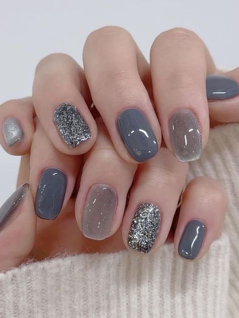 24 Must-Have Winter Nail Designs That Are Total Game Changers! | Everygirl Edit Gray Sparkle Nails, Winter Manicures, Nail Polish Colors Winter, Winter Nail Polish, Light Blue Nails, December Nails, Winter Manicure, January Nails, Plaid Nails