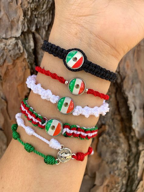 "fun and cute rosary and Mexican flag bracelets  Materials: nylon. size 6\"  with sliding knot closure and completely adjustable to fit any wrist.  Message me with any questions or different sizing prior to purchase 💕.  Remember that handmade pieces are always unique and they never look exactly the same 🤩 that's why they are so special 😍😉. ️🎁 Follow  me on Instagram  and Facebook for giveaways, special offers and discounts   @roxysshop2021 🧿💎Jewelry Care💎🧿 If your bracelet is made of gold/silver plated beads or any metal beads and charms please follow the next care:  -Keep away from moisture  -Allow perfumes and lotions dry before wearing  -Remove when sleeping  -Remove when active (exercise, outdoors activities , swimming,etc.) -Remove before entering water. -Store in dry places Words On Bracelets Ideas, How To Make A Mexican Bracelet, Mexican String Bracelets, Cute Mexican Bracelets, Mexican Jewelry Necklaces, Mexican Style Bracelets, Mexican Bracelets Handmade, Mexico Beaded Bracelets, Cute Rosary