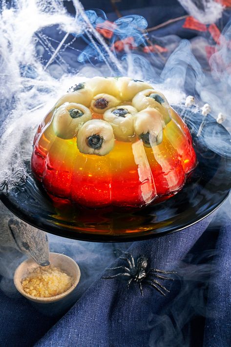 Three layered jelly is shown with lychees stuffed with blueberries that look like eyeballs. Halloween Jelly, Best Cast Iron Skillet, Green Jelly, Perfect Halloween Party, Fun Halloween Food, Soup Maker, Halloween Eyeballs, Halloween Baking, Best Slow Cooker