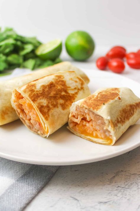 Cheesy Bean and Rice Burritos - BeeyondCereal Cheesy Bean And Rice Burrito, Bean And Rice Burrito, Rice And Bean Burrito, Salsa Rice, Freezer Burritos, Rice Burrito, Bean And Cheese Burrito, Freeze Beans, Bean And Rice