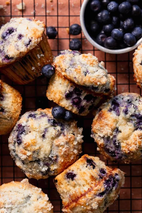 Skip the bakery lines and make bakery style blueberry muffins at home! You'll love the crispy muffin tops, super moist and fluffy texture, and juicy blueberries in every bite. They're made in one bowl and ready to eat in less than 1 hour! Blueberry Muffins Half Baked Harvest, Breakfast Ideas To Bring To A Party, Blueberry Muffin Starbucks, Ambitious Kitchen Blueberry Muffins, Baking Recipes With Blueberries, Blueberry Muffins With Frozen Berries, Best Blueberry Bread Recipe, Blueberry Apple Muffins, Bakery Style Baked Goods