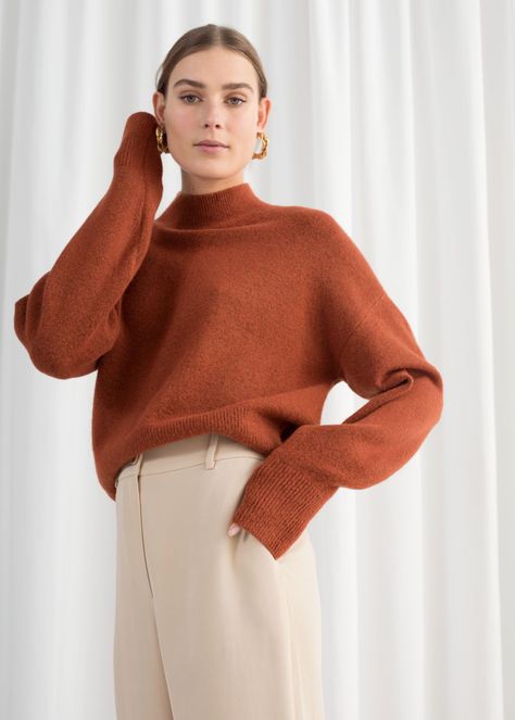 Model front image of Stories mock neck sweater in orange Rust Orange Sweater Outfit, Orange Sweater Outfit Winter, Burnt Orange Top Outfit, Orange Sweater Outfit, Rust Sweater, Simple Winter Outfits, Winter Sweater Outfits, Color Outfits, Jumper Outfit