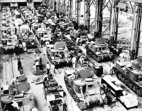 In this July 4, 1942 file photo, 28-ton tanks, called "General Grants" by U.S. forces in the Middle East who used them in the battle for Egypt, are turned out in mass production by the Chrysler Corporation’s tank arsenal in Detroit. Detroit History, Industrial Photography, Pure Michigan, Detroit Michigan, Mass Production, July 4, The Middle East, Black And White Photographs, The Battle