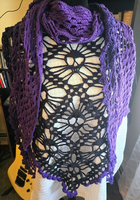 Purple and Black Crochet Skull Lace Shawl https://blackmagicfiberarts.com/purple-and-black-crochet-skull-lace-shawl/ . . . . . . . . . . . . . #HandmadeShawl #CrochetLace #SkullDesign #GothicFashion #PurpleAndBlack #ArtisanCraft #UniqueAccessories #BohoStyle #ElegantShawl #FiberArt #handcraftedfashion #halloweenvibes #halloween2024 #halloweenfashion Elegant Shawl, Crochet Skull, Lace Shawl, Black Crochet, Halloween Fashion, Skull Design, Artisan Craft, Crochet Lace, Gothic Fashion