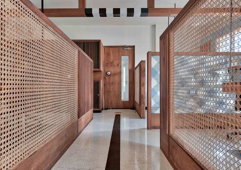 The executive workspaces have partitions made of reclaimed wood and cane weave | Compartment s4 - The Architects Diary Tiles Interior Design, Bedroom Floor Tiles, Offices Interior, Shapes Composition, Jali Design, Online Architecture, Partition Walls, Corporate Interiors, Famous Buildings