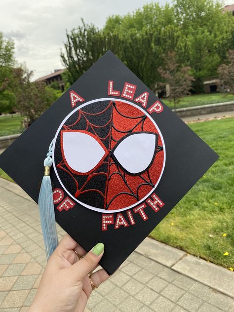 Grad cap inspired by Spiderman into the spiderverse! Spiderman Grad Caps, Spiderverse Graduation Cap, Spider Man Grad Cap, Graduation Cap Marvel, Fun Grad Cap Ideas, Cap Decoration Graduation Spiderman, Deadpool Graduation Cap, Miles Morales Grad Cap, Miles Morales Graduation Cap