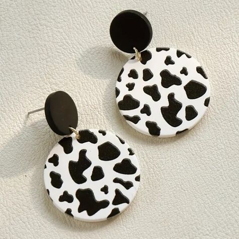 Playful Black And White Cow Print Stud Earrings. The Design Is A Bit Raised From The White Background So They Do Have Some Texture To Them. The Bottom Portion Moves Freely From The Top Stud Backing Making Them The Perfect Earring. Approx 1.75” In Length From The Top Circle And Approx 1 1/8” At Its Widest Point. Cow Earrings Clay, Black And White Cow Print, Cow Earrings, White Cow Print, Black And White Cow, Collection Ideas, White Studs, White Cow, Earring Collection