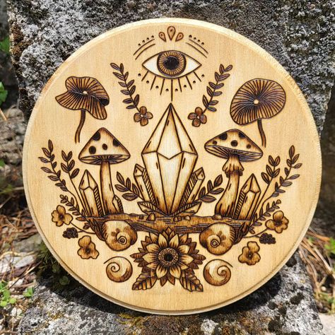 This hand wood burned cottagecore wall hanging is looking for the perfect home! Link to my shop in bio. 🔥🌿 https://moonmothandtorch.etsy.com #moonmothandtorch #melissacalvert #crystals #garden #pyrography #pyrographersofig #pyrographer #woodburning #woodburned #cottage #cottagecore #cottagewitch #hedgewitch #nature #woodart #flowers #witch #mushrooms #fungi Pyrography Gifts, Simple Wood Burning Patterns, Crystals Garden, Pyrography Tips, Wood Burning Tips, Pyrography Tools, Burning Wood, Cottage Witch, Wood Burning Tool