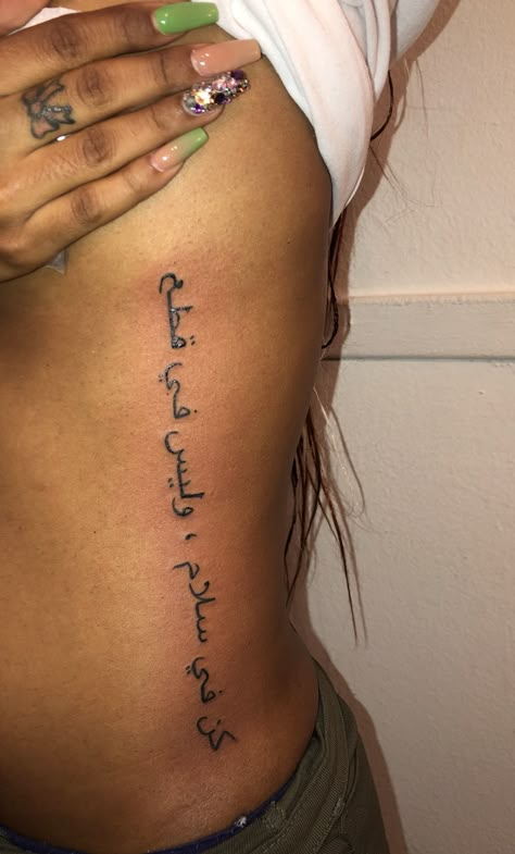 Side Tattoos With Meaning, Back Arabic Tattoo Women, Side Spine Tattoos For Women, Side Writing Tattoos Women, Tattoo Ideas For Side Ribs, Script Side Tattoos Women, Side Stomach Tattoos Women Quotes, Vertical Side Tattoo, Down The Side Tattoos Women