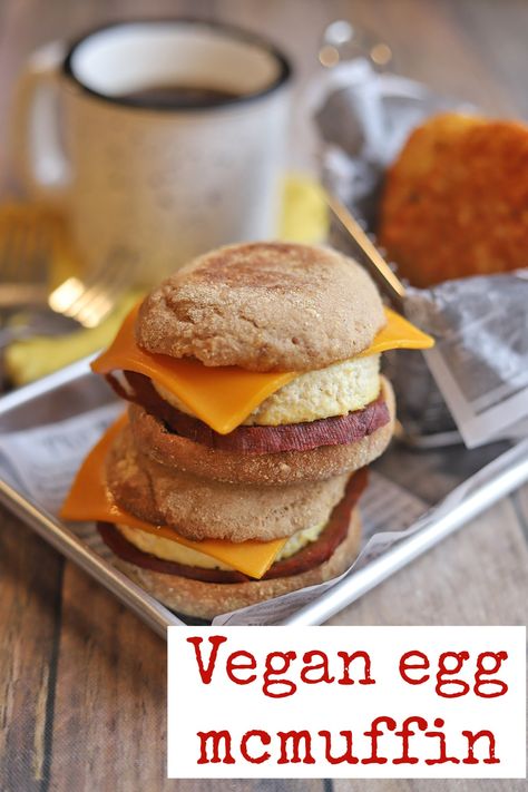 This vegan egg mcmuffin recipe has the flavors of that McDonald’s fast food favorite but in plant-based form. It’s made with tofu egg, seitan ham, and vegan cheddar on an English muffin. Perfect for a quick & easy breakfast that’s sure to satisfy. #veganbreakfast #veganbrunch #vegansandwich Seitan Ham, Handheld Breakfast, Egg Mcmuffin Recipe, Vegan Ham, Vegan Copycat, Quick Easy Breakfast, Tofu Breakfast, Egg Mcmuffin, Tofu Vegan