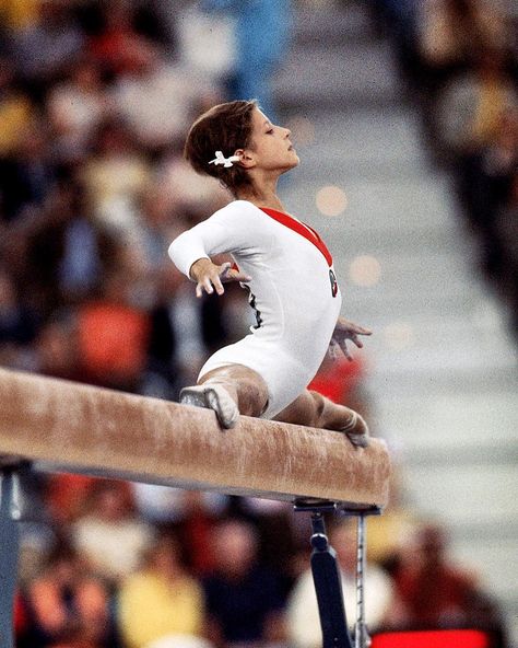 Gold Medalist Olga Korbut of the USSR on balance beam during competition at Olympic Sports Hall at 1972 Olympics in Munich.  Photo by Neil Leifer  #sportsillustrated #sipicturecollection #siclassic #olympics #sioriginals Russian Gymnastics, Olga Korbut, Neil Leifer, Alina Kabaeva, 1972 Olympics, Gymnastics Pictures, Olympic Gymnastics, Balance Beam, Sport Gymnastics