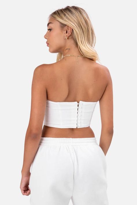 Rachelle is selling their adika white denim corset for $25 (34% off retail) on curtsy, the sustainable thrifting app.. Nice stretchy material, form fitting.. Fast delivery, full service customer support.. One string is broken on the back but looks fine if you tuck it in / could cut it.You can look new details of Denim Corset Top Adika by click this link : view details Corset Back View, White Denim Corset, Corset Top Back, Denim Corset Top, Corset Style Tops, Denim Corset, Corset Back, Back View, Corset Style