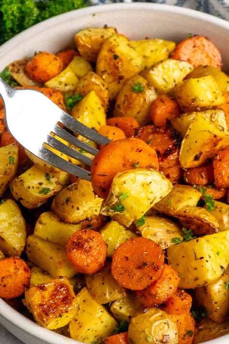 Roasted Potatoes and Carrots Crockpot Carrots And Potatoes, Carrot Potato Recipes, Potatoes Carrots Crockpot, Crockpot Potatoes And Carrots, Potatoes Carrots And Onions In Oven, Roast Potatoes And Carrots Oven, Potato And Carrot Recipes, Easy Roasted Potatoes And Carrots, Potato’s And Carrots