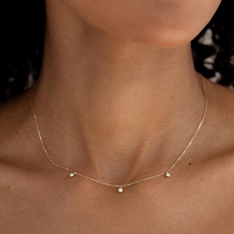 This timeless necklace features three bezel-set diamonds on a 14k gold chain. This effortlessly elegant necklace will dress up any look and makes a wonderful gift. 3 lab grown diamonds, each with a width of 2mm 0.09 total carat weight Bezel setting Necklace has an adjustable length and can be worn at 16", 17" and 18" Timeless Necklace, Trendy Ring, Bezel Set Diamond, Elegant Necklace, Sustainable Jewelry, Elegant Necklaces, Traditional Jewelry, High Quality Jewelry, Minimal Fashion