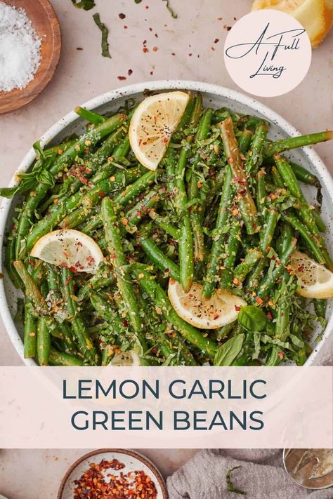 Add a flavorful side dish to your meal with these roasted Lemon Garlic Green Beans. Crispy, slightly charred, and seasoned with zesty lemon, garlic, and aromatic ingredients, these green beans make for a great addition an any weeknight dinner! Garlic Beans Green, Green Beans And Garlic, Garlic Greens, Garlic Lemon Green Beans, Lemony Green Beans, Lemon Pepper Green Beans, Summer Green Beans, Roasted String Beans, Green Bean Recipes Lemon