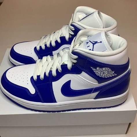 Women's Air Jordan 1 Mid Kentucky Blue Sneakers https://whispers-in-the-wind.com/the-best-shoes-every-man-should-own-essential-footwear-guide/?adidas-grand-court-20-sneakers-for-men-in-blackwhite Royal Blue Jordans, Nike Blue Shoes, Jordan 1 Mid Kentucky Blue, White And Blue Sneakers, Blue And White Jordans, Royal Blue Sneakers, Royal Blue Shoes, Mid Sneakers, Nike Fashion Shoes