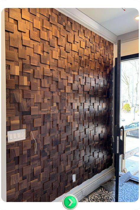 Wood block accent wall creates a bold and dynamic entryway. The textured wood panels catch the light, adding dimension and a natural yet modern touch to the space. Stained Wood Accent Wall, Brick Accent Wall Ideas, Entryway Accent Wall Ideas, Entryway Accent Wall, Creative Entryway, Brick Accent Walls, Brick Accent Wall, Ski Lodge Decor, Textured Wood