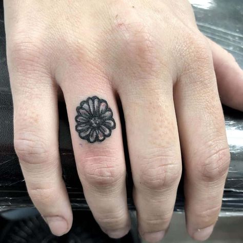 Ring finger tiny black and grey daisy tattoo Ring Finger Tatoo, Strawberry Tattoo Ideas, Daisy Tattoo Meaning, Daisy Tattoo Ideas, Strawberry Tattoos, Tattoo Ideas And Meanings, Daisy Tattoos, Black And White Tattoos, Daisy Flower Tattoos