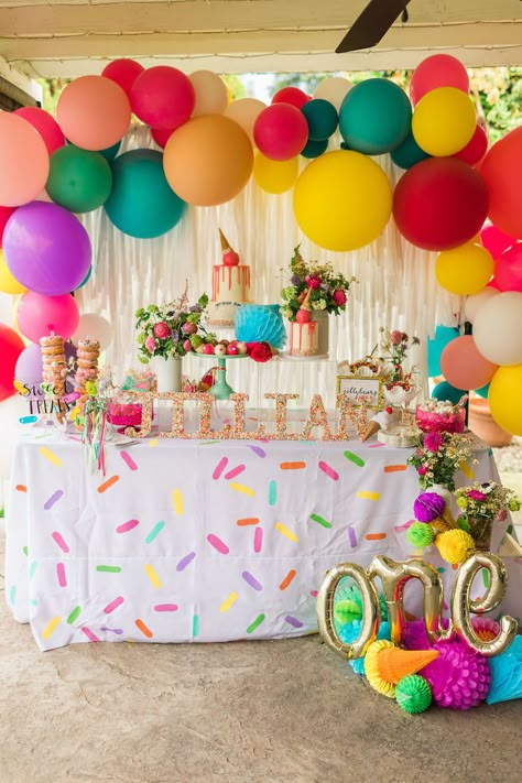 I'm swooning over the sweetness in this Sprinkles and Ice Cream Birthday Party by Juliet Boydstun of the COOP - LA, out of California! Dripping with details delicious and darling, this first birthday celebration is packed with ideas you have to get a scoop of! So lick your lips and take a bite out of these adorable elements that are beyond amazing:  Acrylic Party Signage Melting Ice Cream Cone Party Hats Sprinkle Linens Colorful Dessert Table Balloon Garland  Ice Cream Themed Partyware Sprinkle Colorful Dessert Table, Ice Cream Cone Party, 23 Bday, Sprinkles Birthday Party, Party Signage, 21st Ideas, Cream Birthday Party, Melting Ice Cream, Colorful Birthday Party