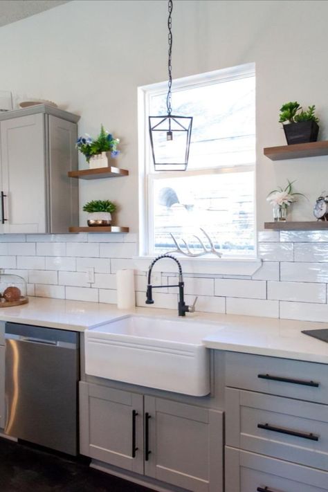 Farmhouse sinks say a lot about style and durability. Also known as apron sinks, these are commonly found in country-style homes and feature a large, deep basin (sometimes double basin), as well as a wide base to hold more pots, pans and whatever else you keep in the kitchen sink. #farmhousesink #kitchensink #kitchenideas #farmhousestyle #kitchendesign #singlesink Apron Sinks, Basin Kitchen Sink, Black Pendant Lamp, Sink Toilet, Farmhouse Sinks, White Kitchen Sink, Farmhouse White, Apron Sink, Toilet Bathroom