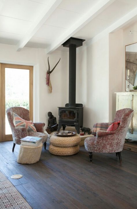 Wood Burning Stove Corner, Corner Wood Stove, Corner Stove, Stove Decor, Round Wood Table, Corner Seating, Wood Stove Fireplace, Freestanding Fireplace, Corner Fireplace