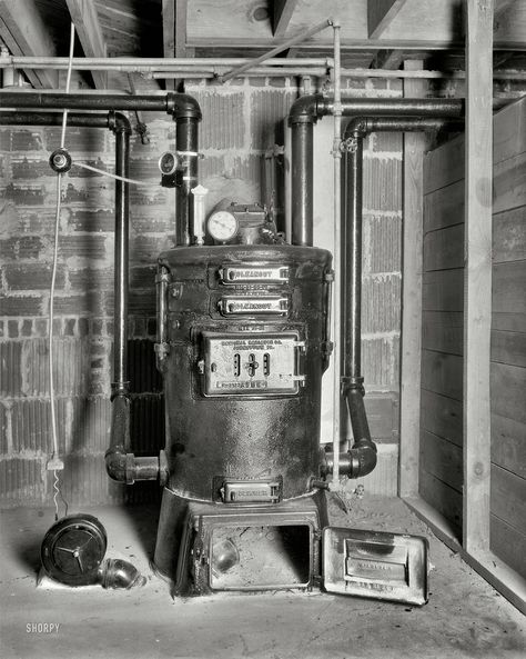 Neat old coal boiler or furnace.  it even has an electric blower to feed air to it. pretty high tec and just plain neat! Johnstown Pennsylvania, Shorpy Historical Photos, Hydronic Heating Systems, Hydronic Heating, Antique Stove, Cast Iron Radiators, Water Boiler, Central Heating System, Fireplace Inserts