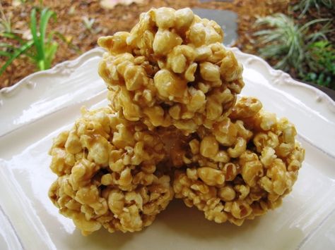 The kids love helping me make these. They are wonderful for school party treats. Also, you can add almonds or peanuts for an extra flair. Carmel Popcorn Balls, Caramel Popcorn Balls Recipe, Candy Popcorn Balls, Popcorn Balls Recipe Easy, Marshmallow Popcorn Balls, Caramel Popcorn Balls, Popcorn Balls Recipe, Peanut Butter Popcorn, Popcorn Recipes Caramel