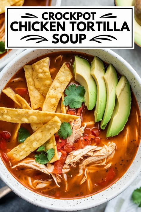 Crockpot chicken tortilla soup topped with avocado, tortilla strips, and cilantro in a white bowl. Crock Pot Chicken Tortilla Soup Recipes, Beef Tortilla Soup Crockpot, Chicken Tortilla Soup Crock Pot No Beans, Easy Crockpot Tortilla Soup, Low Fodmap Chicken Tortilla Soup, South West Chicken Soup, Tortilla Chicken Soup Crockpot, Weight Watchers Tortilla Soup, On The Border Chicken Tortilla Soup