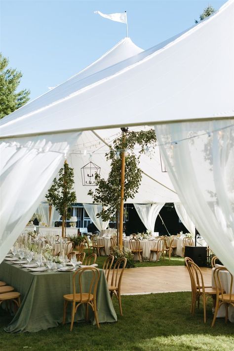 Dreamy Northern Michigan wedding vibes! 🌿 Rental Items: 🌿44'x84' Sailcloth Tent with Wood Wrapped Poles & Billowy Leg Draping 🌿Bentwood Chairs 🌿Provincial White Bar 🌿Auckland Oak Dance Floor 🌿13' x 24" Stage 🌿& More Vendors: Photograohy: @jillianbowes Planning & Coordination: @sincerelygingerweddings Florals: @bittersweetandcofloral Venue: @fountainpoint Catering @eatdrinkcurl #MichiganWedding #EventRentals #SailclothTent #OutdoorWedding #weddingdesigninspo #tentwedding Wedding Tent With Dance Floor, Mountain Tent Wedding, Black Tie Tent Wedding, Big Tent Wedding, Backyard Wedding Ideas Tent, Small Tent Wedding Reception, Tent Wedding Reception Layout, Winter Wedding Tent, Glass Tent Wedding