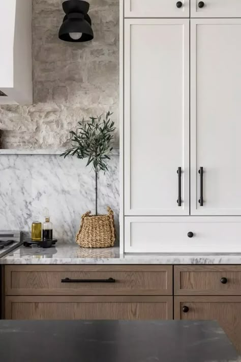 Marble backsplash with ledge and limestone look stone surrounding a plaster hood. Black Kitchen Hardware, White Oak Cabinets, Kitchen Hood Design, Stone Backsplash Kitchen, Two Tone Kitchen Cabinets, White Oak Kitchen, Semi Custom Cabinets, Two Tone Kitchen, Oak Kitchen Cabinets