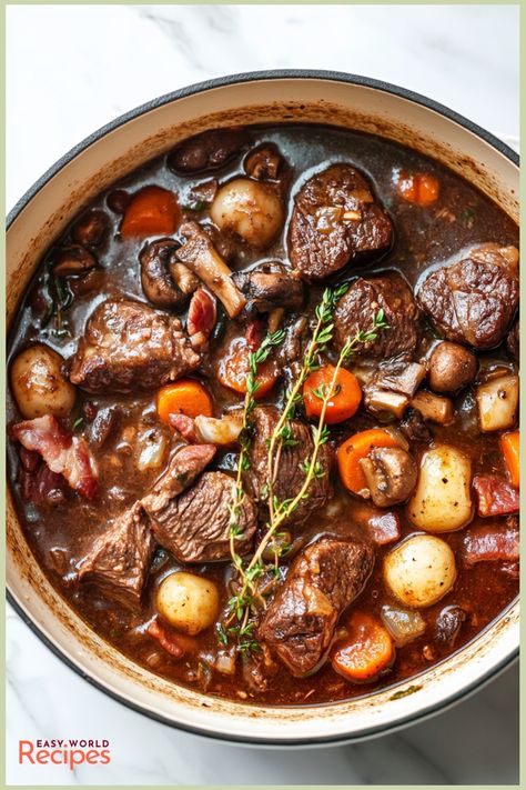 Beef Bourguignon, also known as Bœuf Bourguignon, is a classic French beef stew that’s slow-cooked in red wine with tender chunks of beef, smoky bacon, aromatic herbs, and hearty vegetables. This dish is famously rich and flavorful, making it perfect for a cozy family dinner or a special gathering. Best Beef Bourguignon Recipe, Easy International Recipes, Salmon Recipes Brown Sugar, Savory Beef Stew, Osso Bucco Recipe, French Beef Stew, Beef Chunks, Slow Beef Stew, Beef Bourguignon Recipe