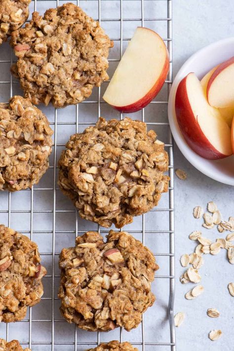 These chewy cinnamon apple oatmeal cookies are easy to make, taste like fall in a bite and are perfect for leftover apples! Soft and delicious! | Apple Oatmeal Cookies | Apple Cookie Recipe | Oatmeal Cookie Mixins | Egg-Free Cookies | Fall Cookie Recipe | Apple Recipe | Healthy Apple Cookies, Apple Banana Cookies, Oatmeal Apple Cookies, Applesauce Breakfast Cookies, Apple Cinnamon Cookies Healthy, Apple Cinnamon Cookies, Apple Cookie, Apple Cookies Healthy, Easy Apple Pie Oatmeal Cookies