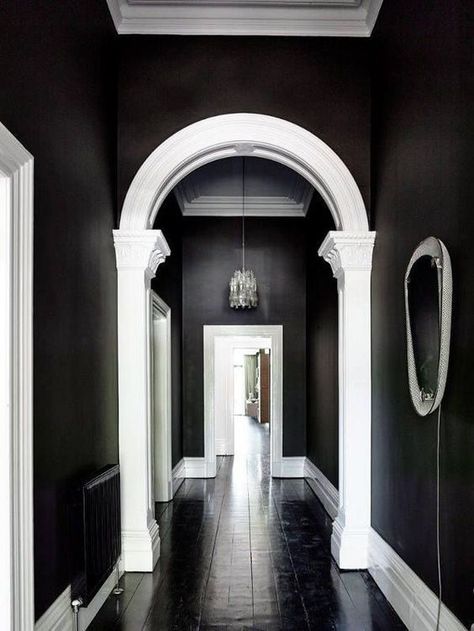 Nov 7, 2019 - Have you ever thought about painting a room in your house black? Maybe a bedroom, bathroom, living, or dining room? We have painted 2 rooms in our home black and I LOVE the moody look it creates. Making the Decision to Paint Walls Black Making the decision to paint a room black is a big… Continue reading → Arched Doorways, Brunswick House, Hallway Light Fixtures, Shelves Design, Shelf Mantle, Black Rooms, Black And White Interior, Dark Walls, Black And White Decor