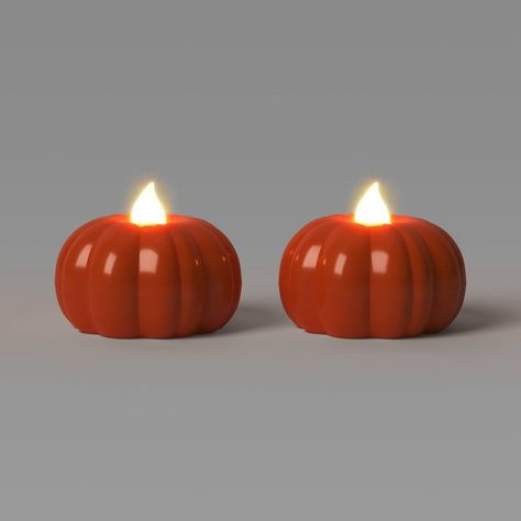 Add a festive glow to any room with the 2-Pack of LED Pumpkin-Shaped Halloween Tea Lights from Hyde & EEK! Boutique™. These orange pumpkin-shaped tea lights are made of plastic and are battery powered. Designed for indoor use only, they light up with an LED-bulb faux flame for a convenient and safe decor accent. Hyde & EEK! Boutique™: Thrilling delights. Curious oddities. Orange String Lights, Halloween Centers, Apartment Halloween, Holiday Room Decor, Get Ready For Halloween, Holiday Room, Halloween Room Decor, Halloween Throw Pillow, Halloween Kitchen