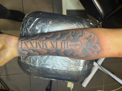 Fore Arm Tattoo Men Half Sleeves Design, Back Side Forearm Tattoo, Front Forearm Tattoos Men, Rose And Roman Numeral Tattoo Forearm, Roman Numeral On Forearm, Rip Tattoos Roman Numerals, Cloud Forearm Tattoo Men, Inner Forearm Tattoo Men Half Sleeves, 2000 In Roman Numerals Tattoo Ideas