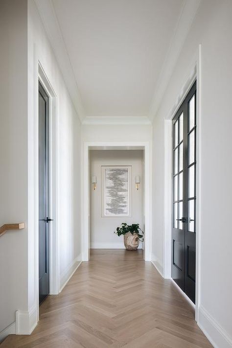 Transitional mudroom hallway finished with oak herringbone wood floors and black closet doors. Transitional Mudroom, Light Grey Kitchens, Wood Floor Design, Herringbone Wood Floor, Herringbone Wood, White Oak Hardwood Floors, Oak Hardwood Flooring, Herringbone Floor, White Oak Floors